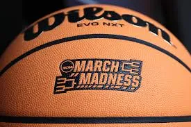 A close up of the march madness logo on a basketball.