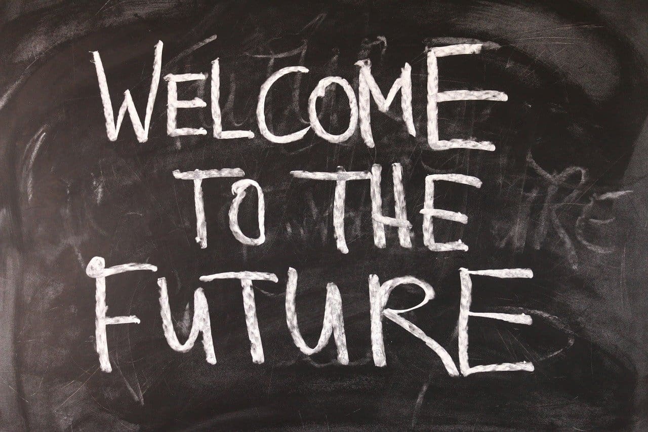 A chalkboard with the words welcome to the future written on it.