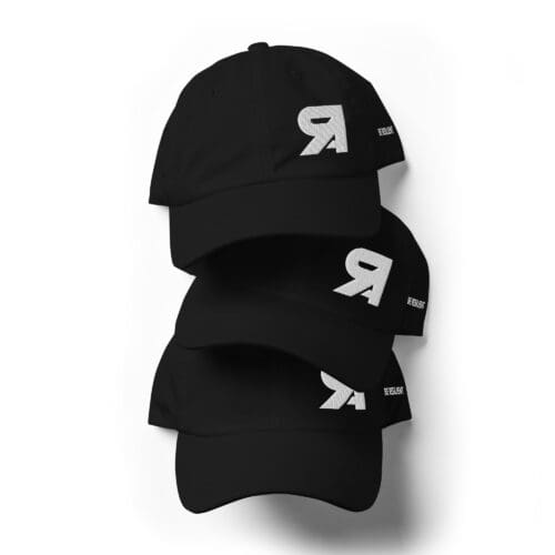 Three black baseball caps with a white reversed R logo stacked together.