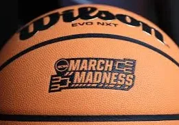 A close up of the march madness logo on a basketball.